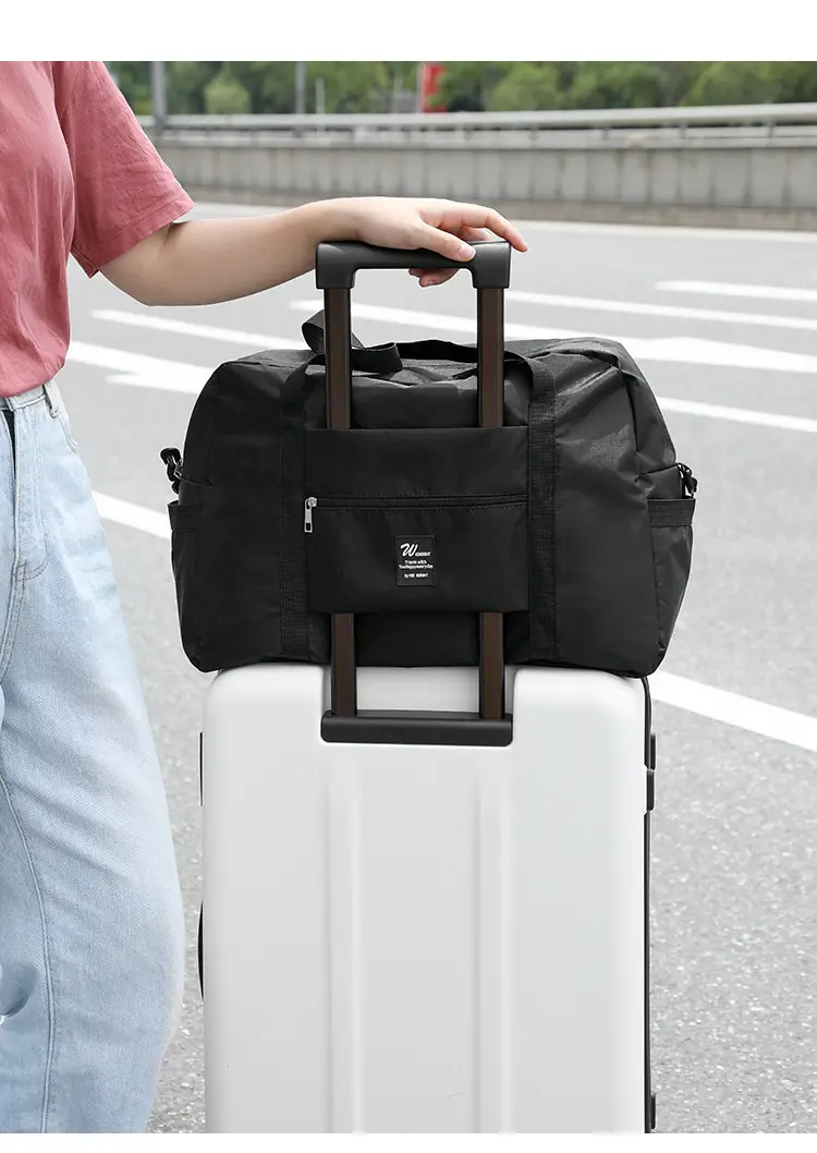 Foldable waterproof storage bag for traveling, handheld capacious suitcase, travel bag — chobi 4